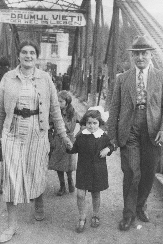 Felicia with her mother and her mother’s cousin under a banner reading “The Road of Life.” Dorna, circa 1937.