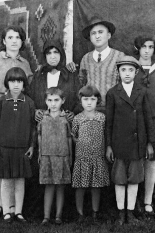 Helen and her family before the war. Back row, left to right: Helen’s sister Esther, her mother, Feige, her brother Simcha and her sister Ruchel. In front, left to right: her sister Brauna (Betty), Helen (Henya), her sister Frieda and her brother Itzik. Remete (Remetea), Romania, circa 1932.